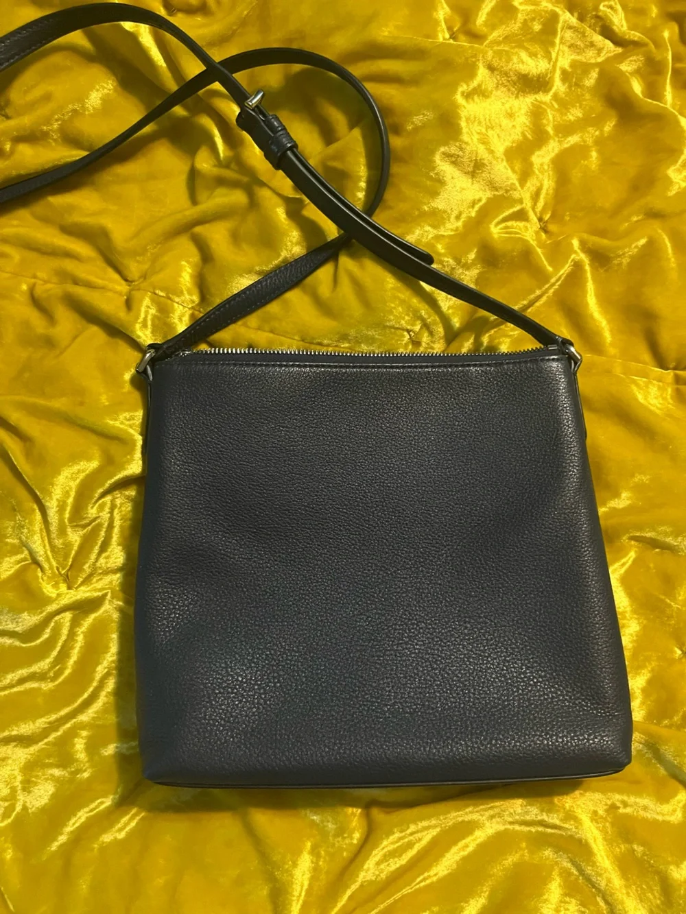 Kate Spade black pebbled leather crossbody with front zip